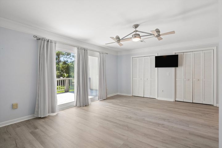 Primary suite with doors to the private deck